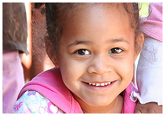 Smiling Girl Wearing Pink Clothing